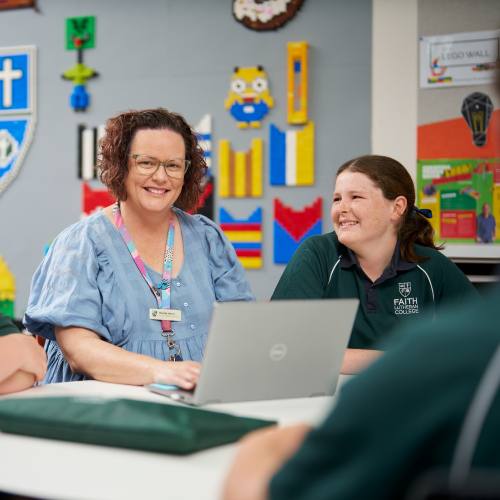 A faith Lutheran College Teacher with her students