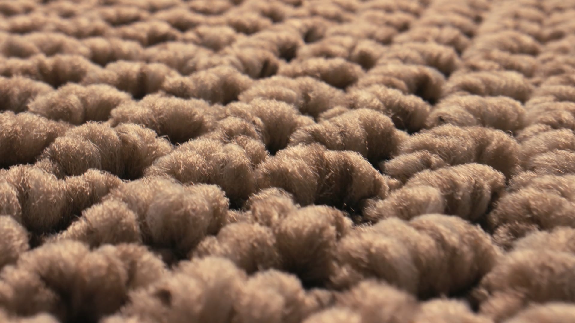 Close up still of a carpet made by EC Carpets